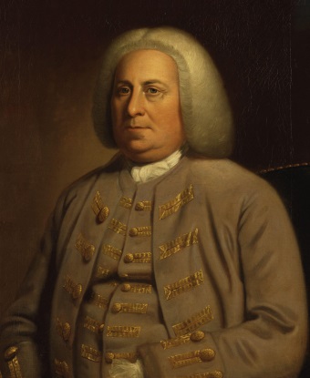 A portrait of a man in a brown suit wearing the gray wig