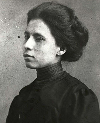 Black and white side portrait of young woman.
