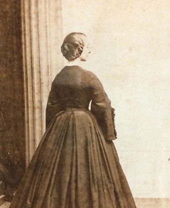 Sepia portrait of a woman in a dress