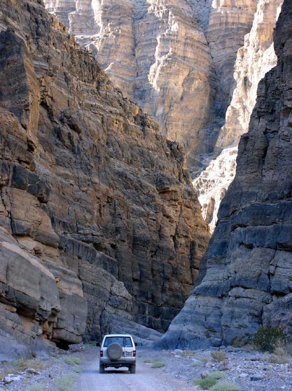The narrows of Titus Canyon can be explored either by high-clearance vehicle or on foot,