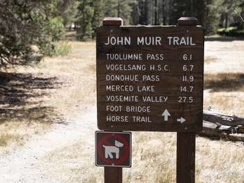 A trailhead sign reads John Muir Trail.