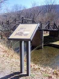 Wayside in front of Randolph Bridge and Shenandoah Canal.