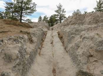 Deep, long ruts in solid rock that were created by wagons as they passed through this area on the Oregon Trail