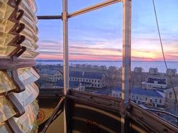 The lantern room of the oldest operating lighthouse in America offers a panoramic view of Sandy Hook at sunset.