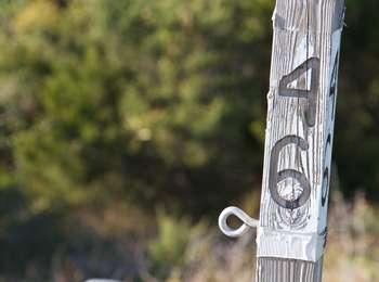 Close-up of the wooden post with