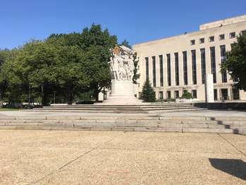 A granite sculpture depicts Meade and several other figures. The sculpture is on top of a pedestal.
