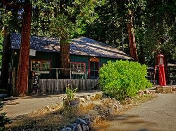 A rustic store with an antique gas pump