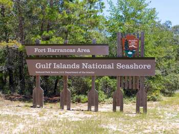 Wooden sign identifying the Fort Barrancas Area.