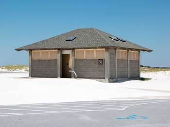 A light grey stone building with