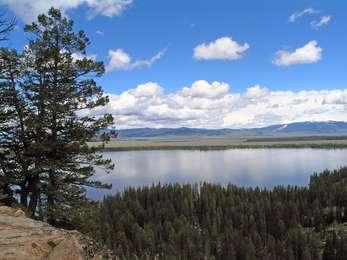 View of Jenny Lake from trail to Inspiration Point looking across lake and valley toward the east.