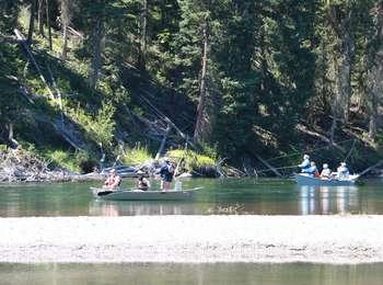 Visitors fishing from two drift boats on the Snake River near Pacific Landing