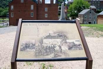 Wayside with John Brown Museum and Monument in the background.