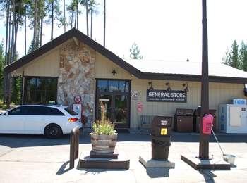Signal Mountain General Store and Gas Station with car parked in front and ice machine to the right.
