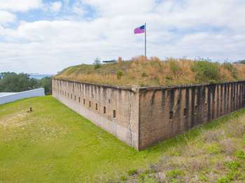 Exterior brick walls of Fort Barrancas and the white walls of the Spanish Water Battery.