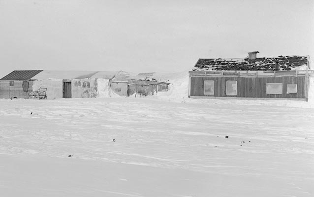 Worksheds and houses on Flaxman Island, Alaska, during winter Worksheds and houses on Flaxman Island, Alaska, during winter