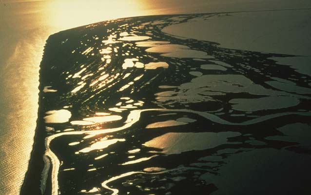 Land juts out into the water in northwest Alaska Land juts out into the water in northwest Alaska