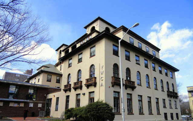 The multi-story YWCA building on a street corner in Cambridge, Massachusetts