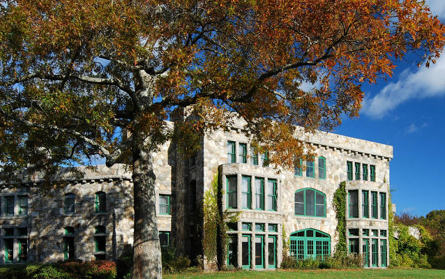 The ivy-covered stone facade of the Ames Mansion