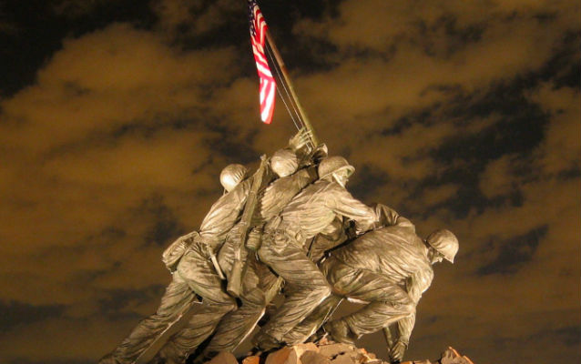 Sculpture of four servicemen raising a flag Sculpture of four servicemen raising a flag