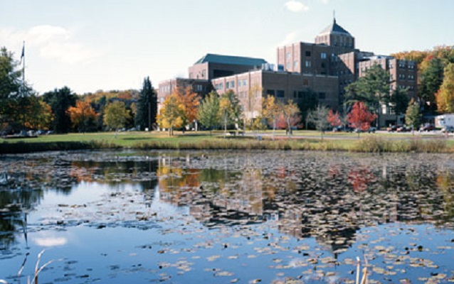 View across water to buildings.