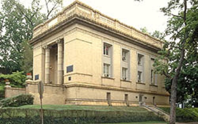 Exterior of a large yellow brick building