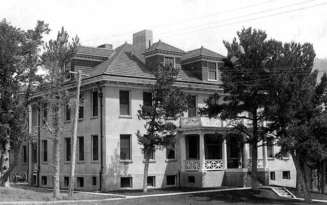 Black-and-white photograph of the third hospital, a three-story, brick building.