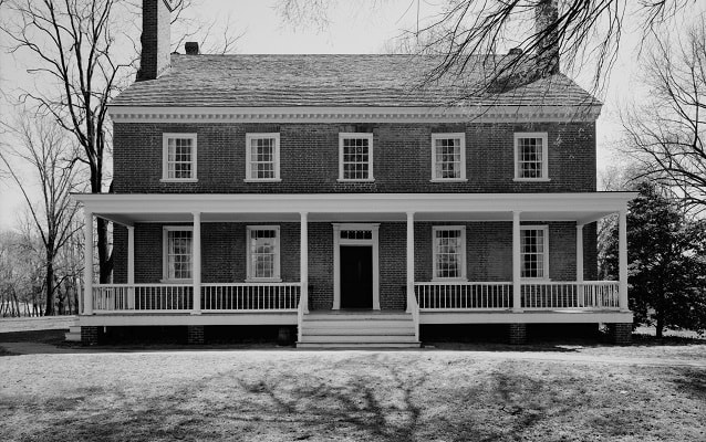 black and white photo of locust grove esterior