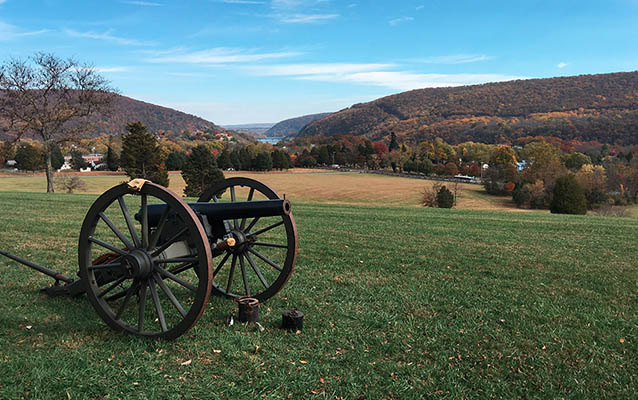 Artillery piece on Bolivar Heights; in the background is the gap in the mountains at Harpers Ferry Artillery piece on Bolivar Heights; in the background is the gap in the mountains at Harpers Ferry