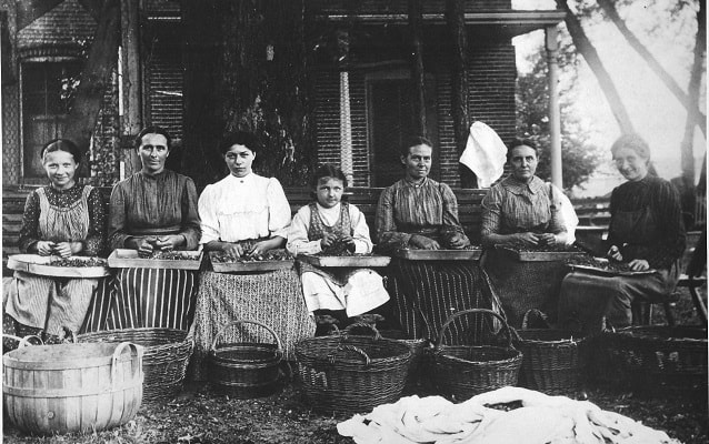 kitchen ladies preparing food for use in the kitchen