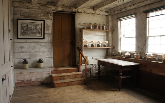 small room with whitewashed walls