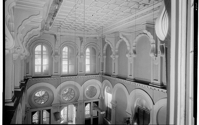 Black and white photo of the interior of the Farmers and Exchange Bank, circa 1930s.