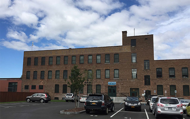 John S. Tilley Ladders Company building. Three story red brick masonry building