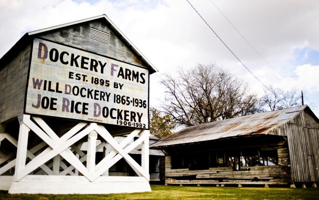 A barn and an shed; the shed reading 