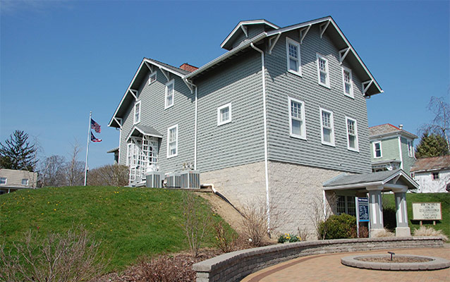 John Glenn Boyhood Home, a two story, frame bungalow house. 