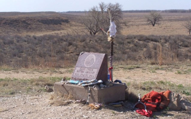 monument and red cloth in front of site
