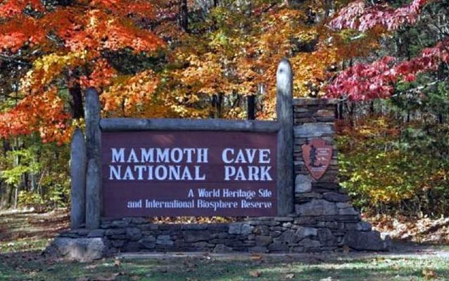 the entrance sign to Mammoth Cave National Park in autumn