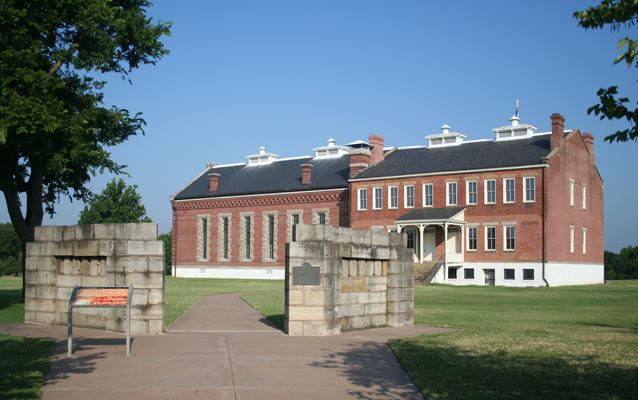 brick building and stone gate