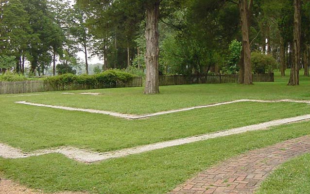 the white outline of the house foundation on green grass the white outline of the house foundation on green grass