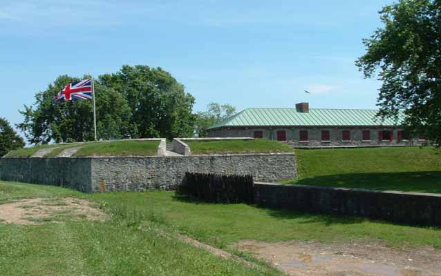 Stone fort in the middle of a green lawn