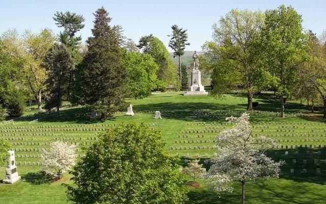Modern photo of Antietam National Cemetery, with Private Soldier Monument in the background Modern photo of Antietam National Cemetery, with Private Soldier Monument in the background