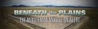 Prairie landscape with a missile silo and film title