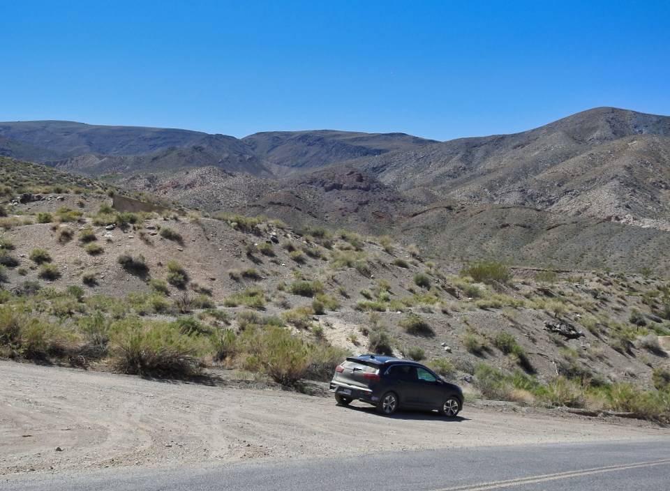 Buildings with desert mountains in background