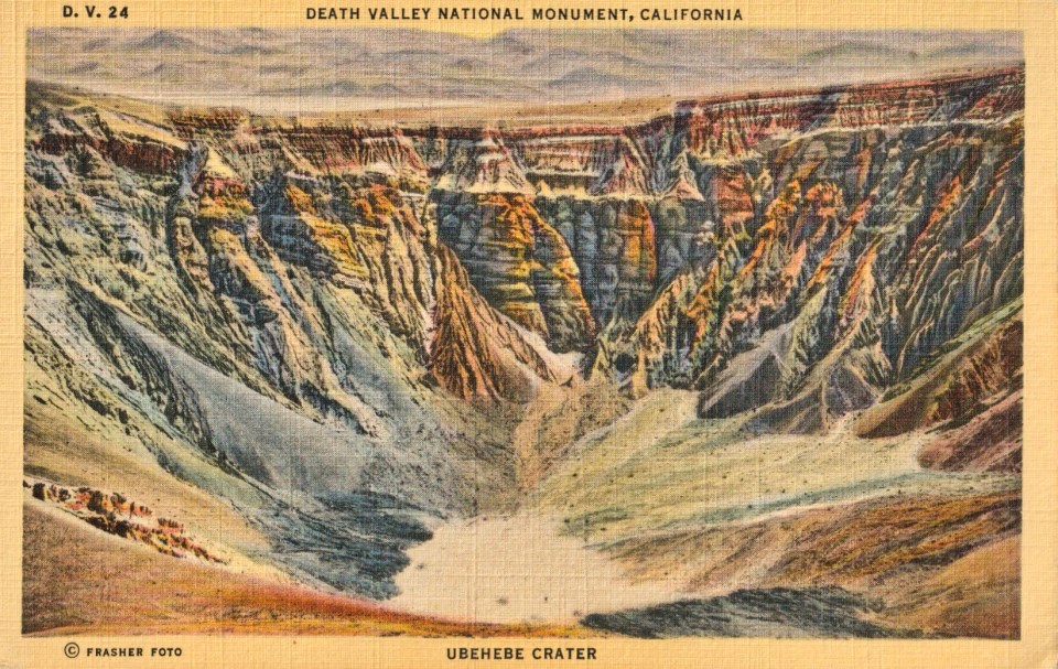 Colorized postcard of rocky crater with pool at bottom.