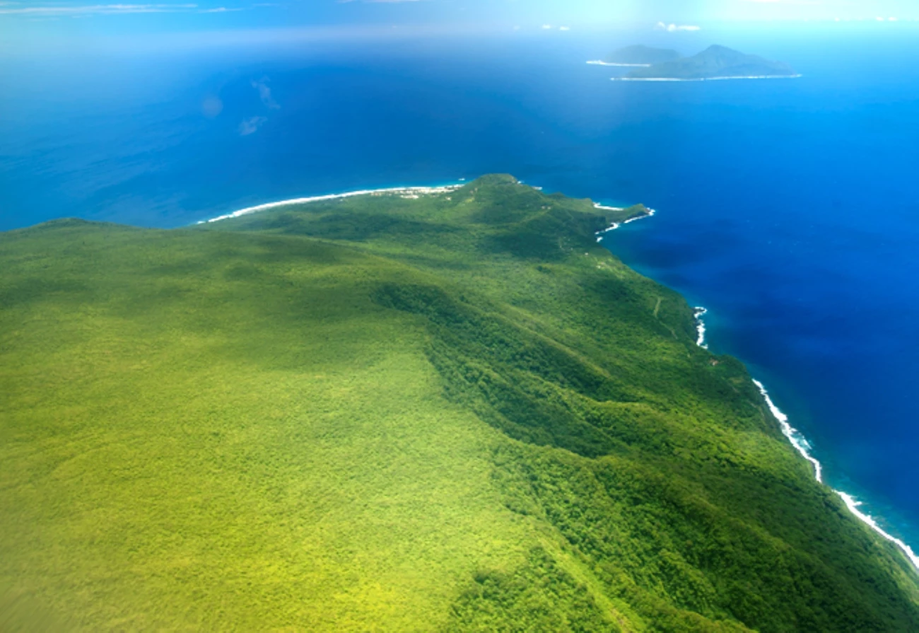 Map Graphic; light blue ocean with two small islands and titled "South Pacific Ocean."