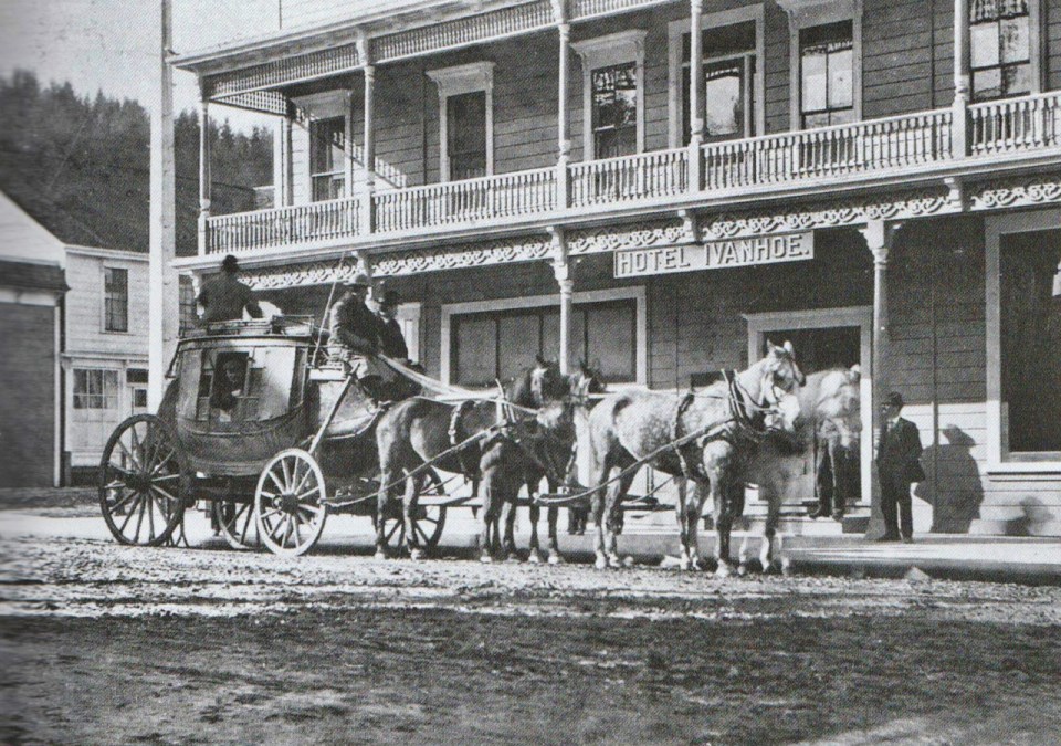Stagecoach in front of old hotel
