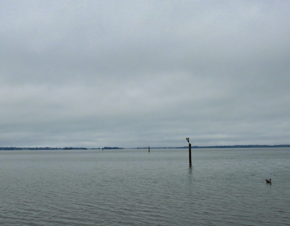 Old ships alongside a long wharf