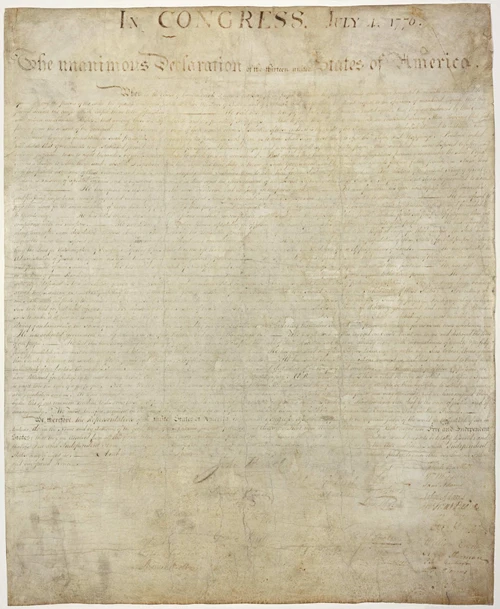 A yellow stained handwritten letter from the 1770s. This is the U.S. Declaration of Independence.