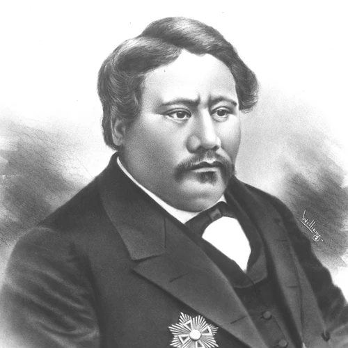 Portrait; black and white photo of male in suit with medal on chest.