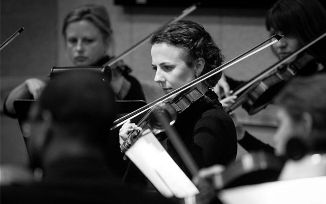 The Fairbanks Summer Arts Festival String Orchestra performs.