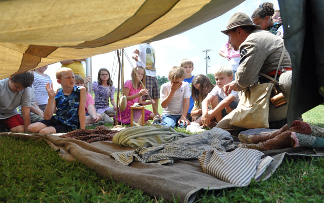 Students explore a Civil War camp